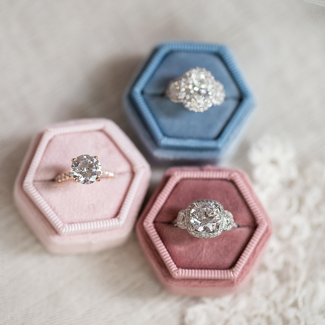 Three rings in velvet ring boxes
